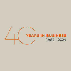 40 years logo with a square stone background